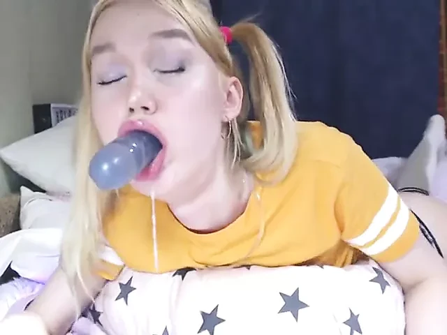 Pigtailed Blonde Chokes, Drools And Gags On A Big Dildo