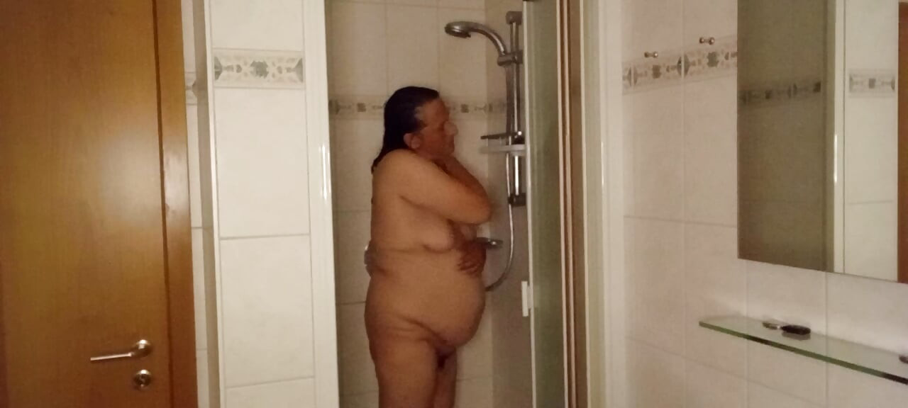 Fat German 53 in the shower – Fat pot belly & sagging breasts