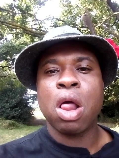 licking lips outdoors