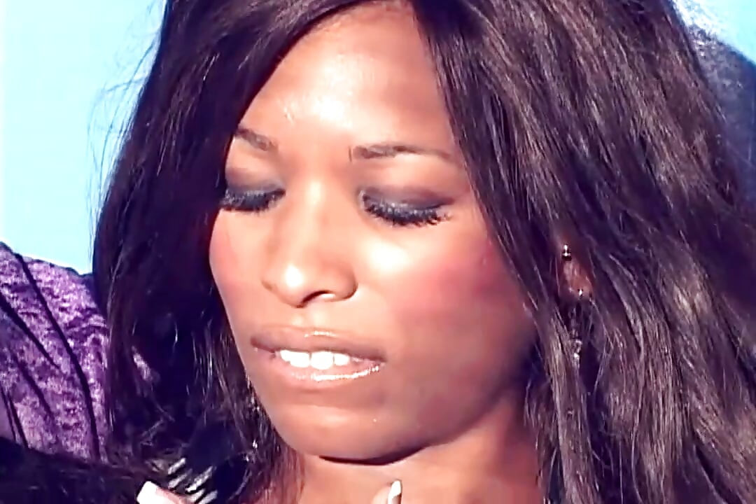 Beautiful Black Cougar Shemale Plays with Cock with a Plug in Her Ass
