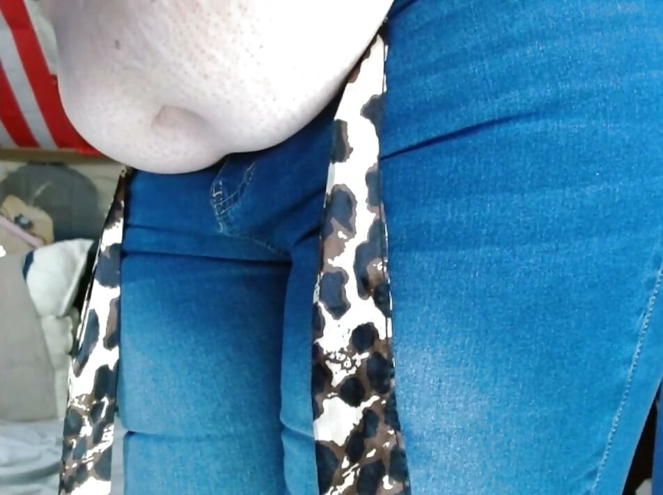 fat sissy with tits wearing and stripping out them tight jeans