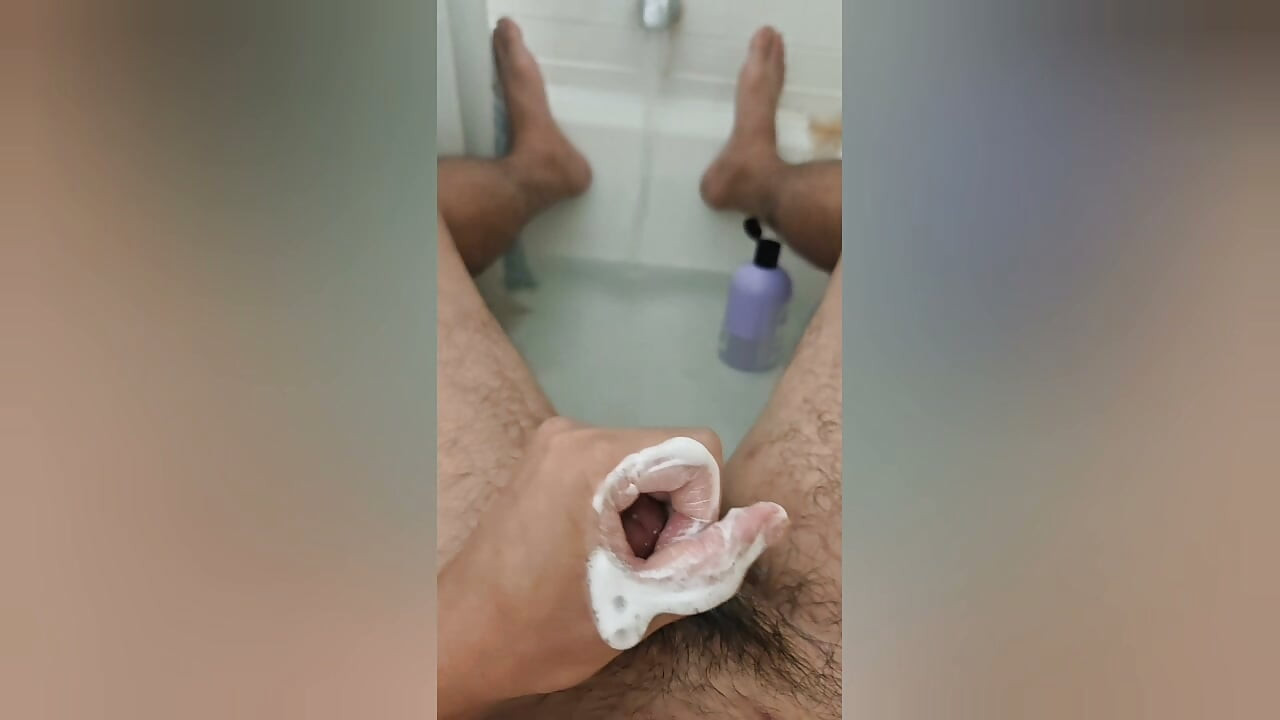 Barefoot in the Tub: A Wet and Sensual Dick Masturbation