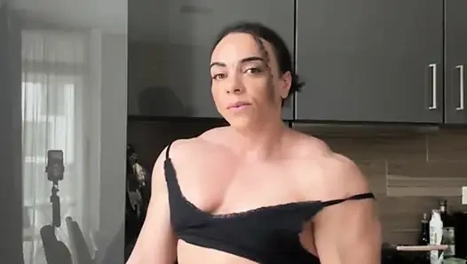 Ebony mom wears dominance like armor over muscular hips