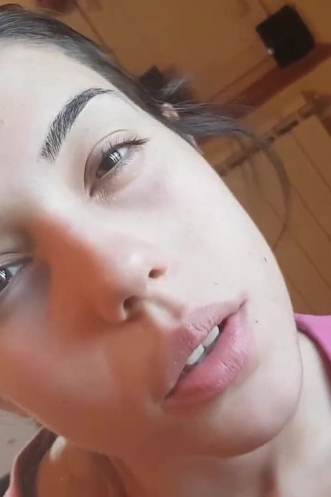 Tempting Italian girl smokes a cigar in a close up video
