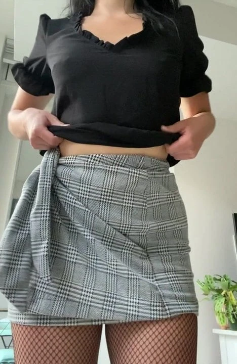 Short skirt cutie with her butt plug