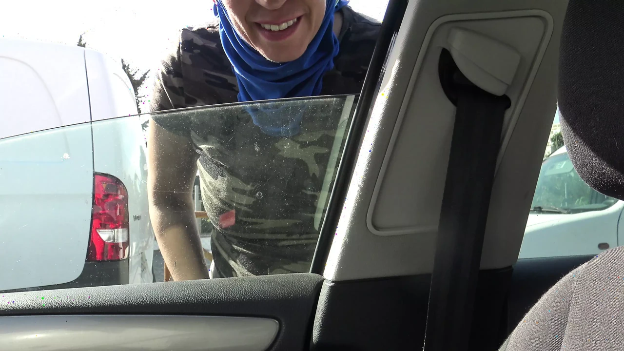 Algerian prostitute with a client in her car in a suburb of Marseille