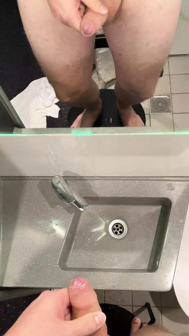 Hard and massive cumshot over the sink