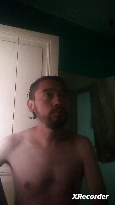 Man does his skincare in the morning