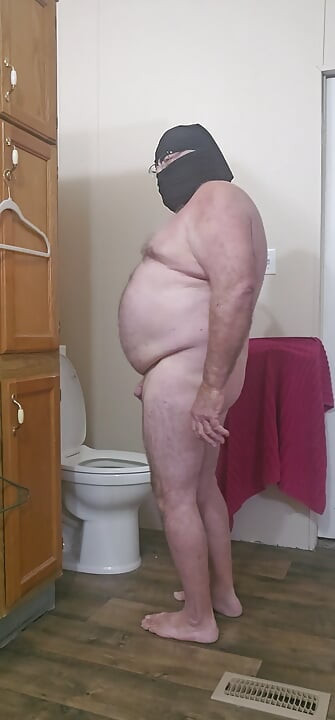 Nasty completely nude exhibitionist in the bathroom.