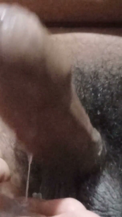 A young man is jerking his penis and releasing semen. He is doing it and is in pain. | Clip 1