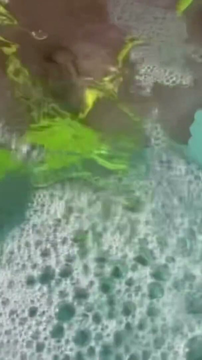 Artemisia Love flashing her juicy big tits underwater for you wearing a sexy bikini | Clip 1