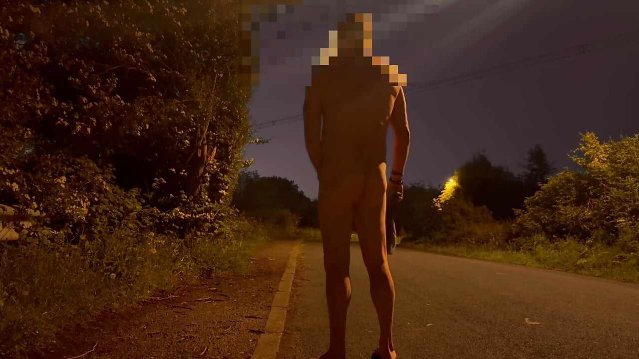 Barefoot nude in road