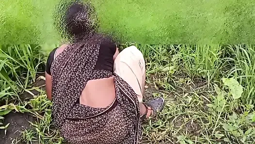 The desi daughter-in-law of the village is taking off her clothes in the millet field and showing her finger in her pussy to her father-in-law.