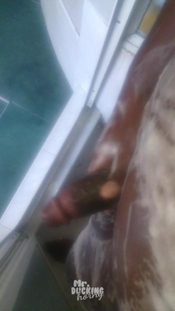 Black VHM having a steamy shower