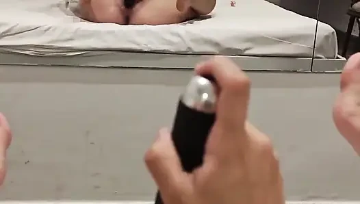 Brunette with Short Hair Uses Her Vibrator in Front of a Motel Mirror
