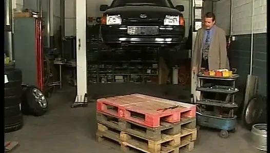 Attractive German slut rides dick in the workshop
