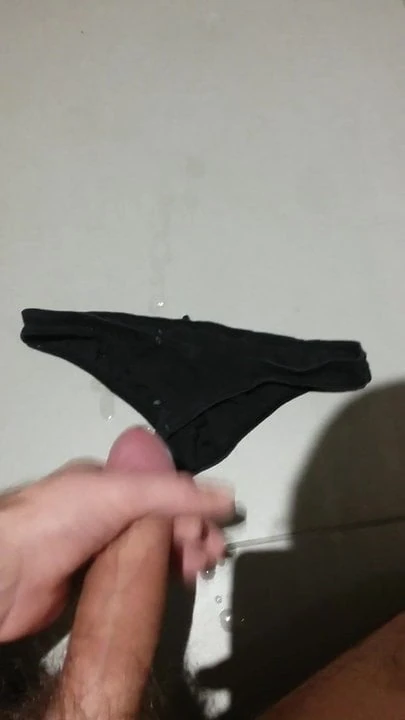 cumshot on black micro thong of a young friend