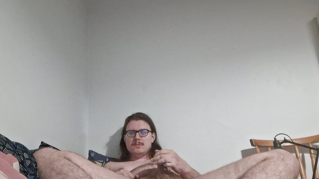 Young guy undresses, jerks off and shows feet