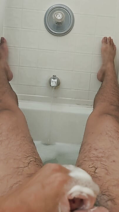 Cleaning Up in the Tub Bathing Solo and Rinsing Off