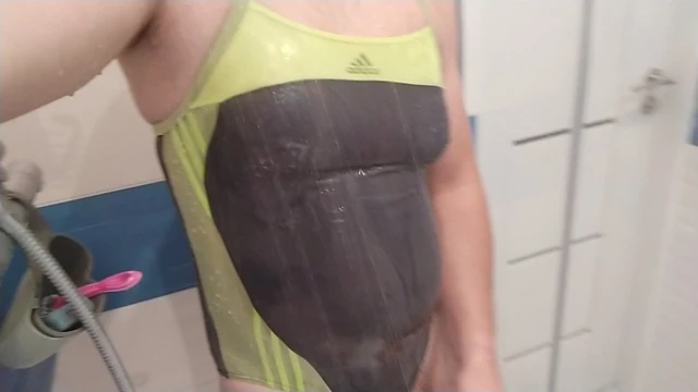 Crossdresser in one piece adidas swimsuit