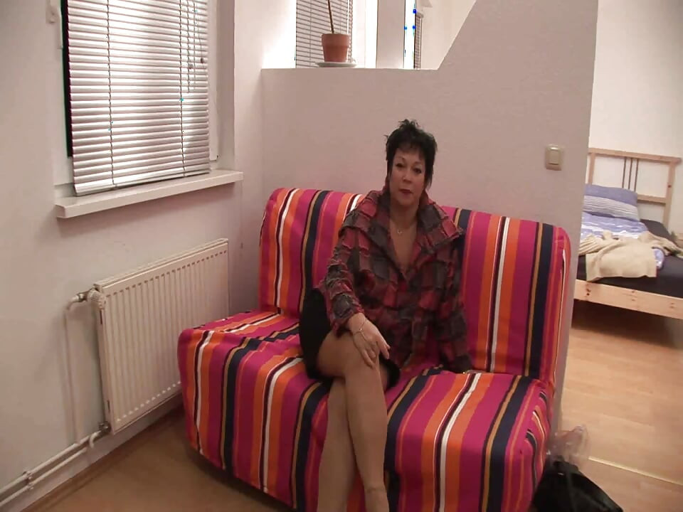 Brunette gilf with big boobs masturbating and blowing cock