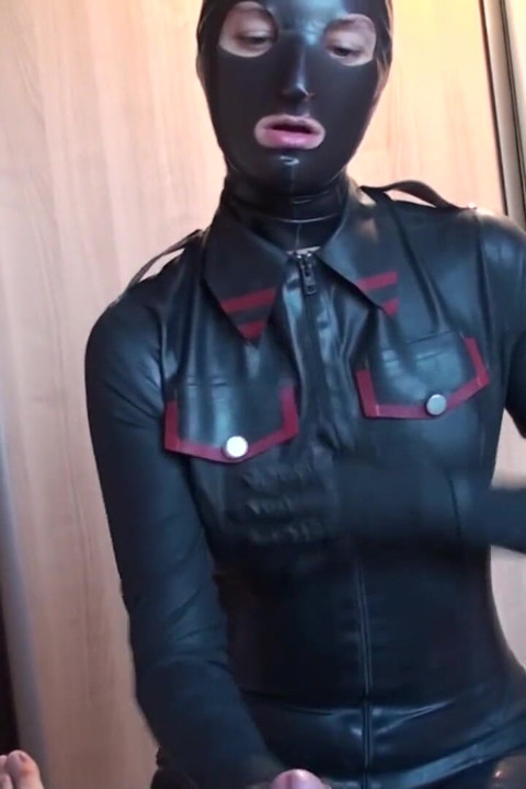 Latex Danielle plays in latex costume with his cock