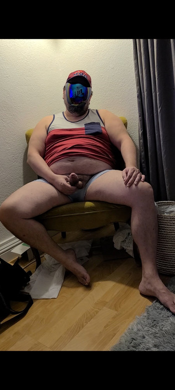 Playing with my uncut latino dick in the corner.  You want to help me?