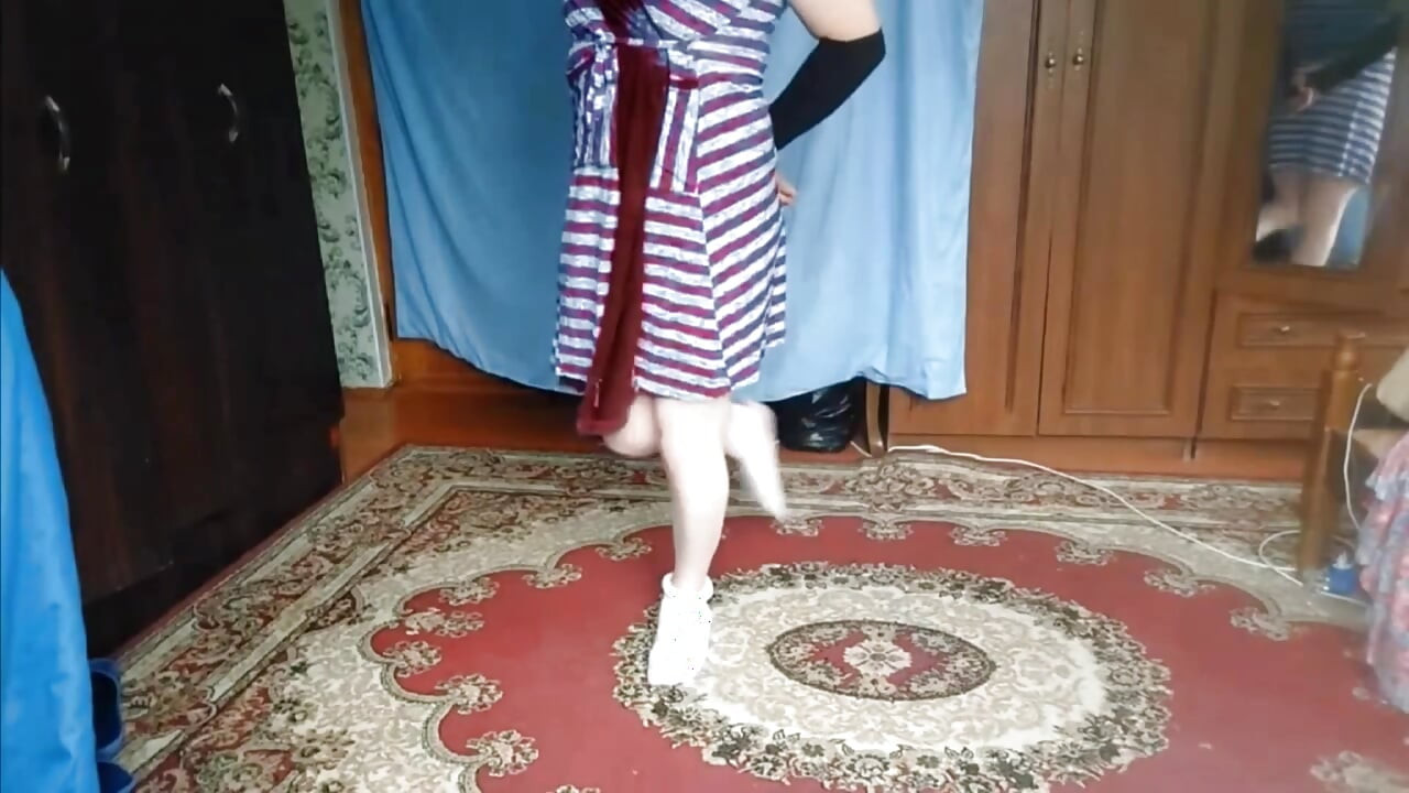 Lovely shemale standing in doorway with soft eyes