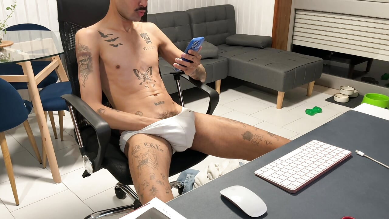 Skinny guy in jeans, pulls his dick out and jerks off on webcam.