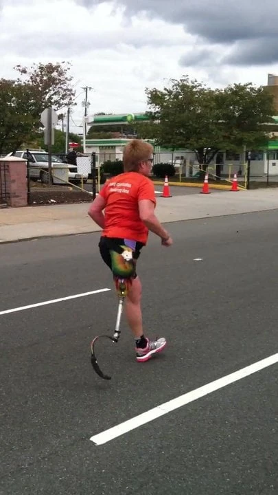 mature amputee with blade leg on