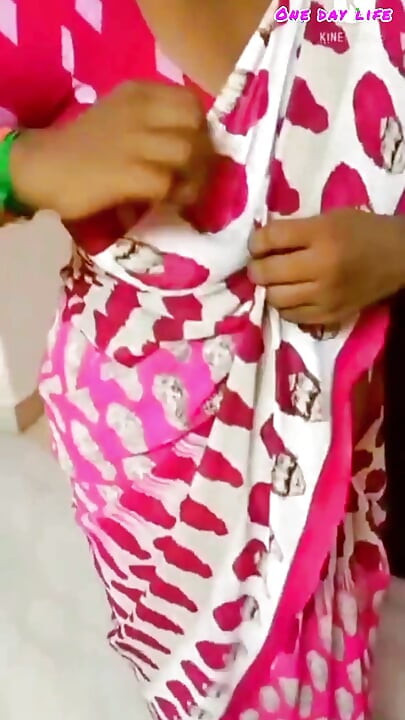 A cuckold husband admires the beauty of his sexy Desi wife after asking her to wear a saree.