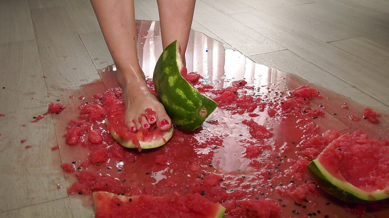 Busty MILF Presents Her Feet and Plays with a Watermelon