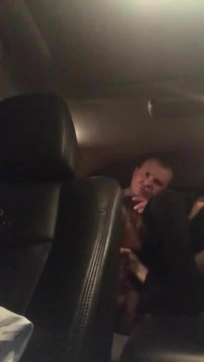 Russian couple in car