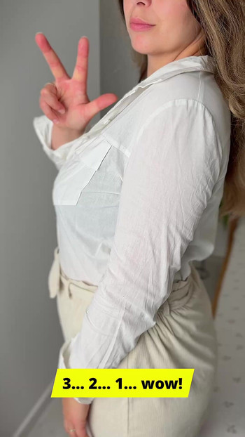 우아한 옷을 입은 밀프가 그녀의 분열을 과시하다