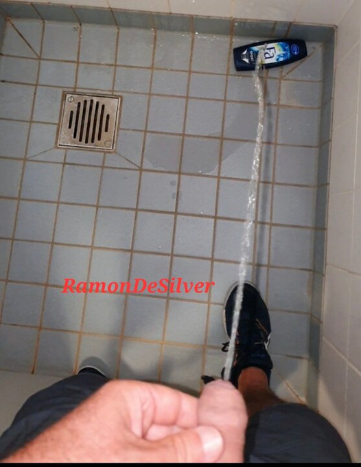 Master Ramon pisses horny in the shower.  very hot