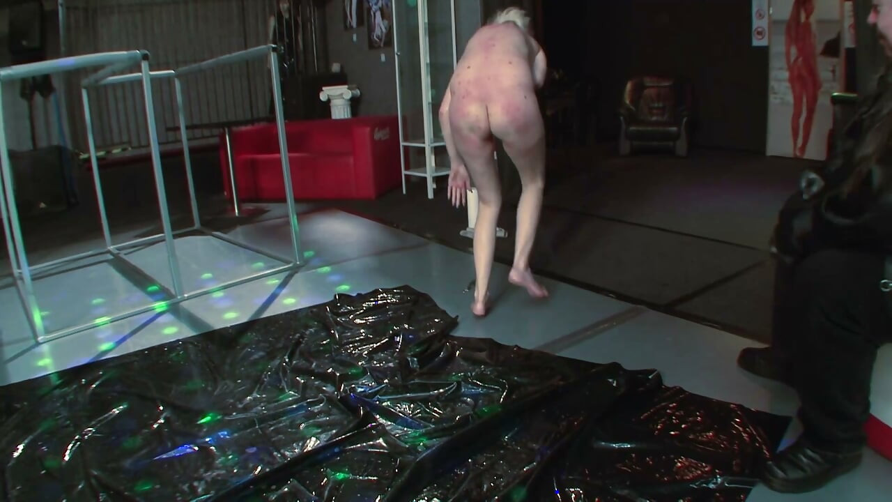 Blonde Sub Wrapped in Plastic for Outdoor Whipping