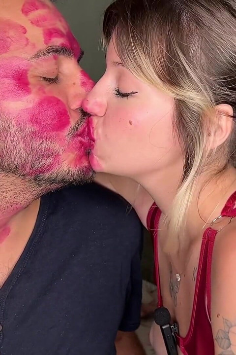 Non Stop Lipstick Kisses All Over His Face