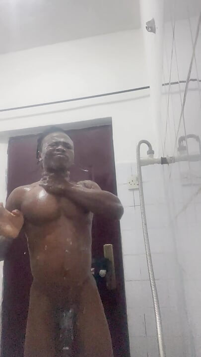 Watch how I take my bath and stroke my black cock