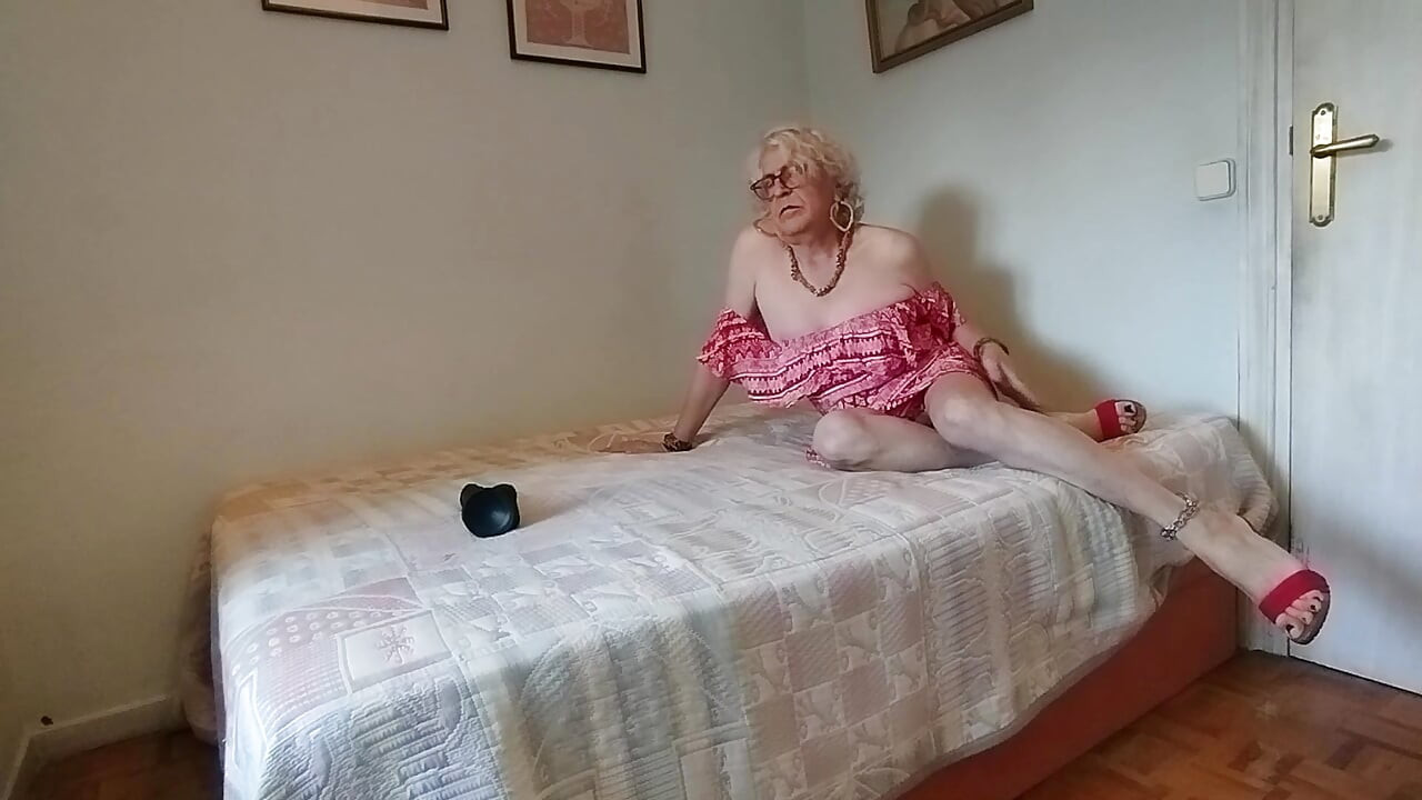 Spanish Shemale Whore Playing with a Black Dildo