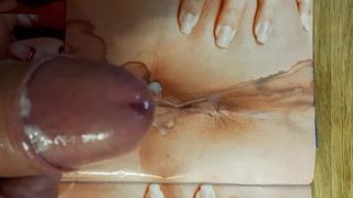 Shooting a load of cum on a cum stained porn mag