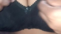 Desi woman wearing bra and blouse after bathing