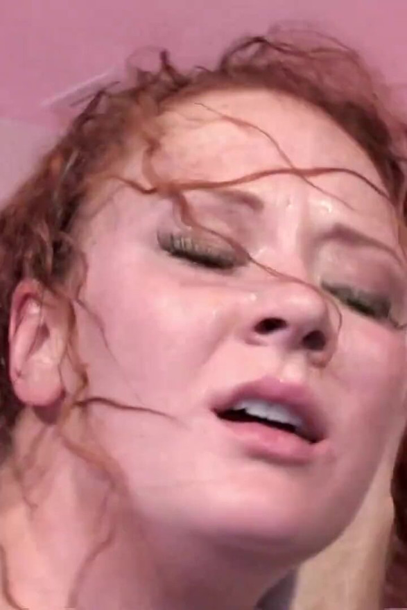 Sensual redhead penetrated by two