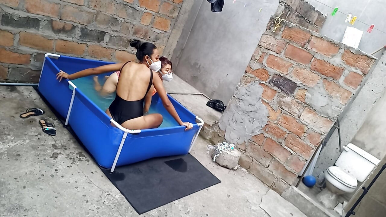 My neighbor is in the pool wearing a very tempting and sexy bikini. She's hot.