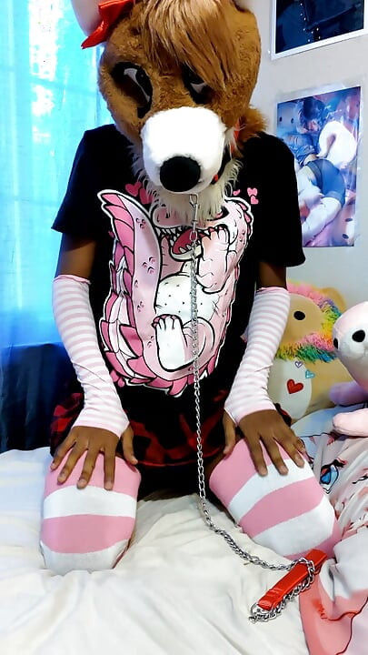 Sissy femboy slut in fursuit shows you his tight ass and chastity cage