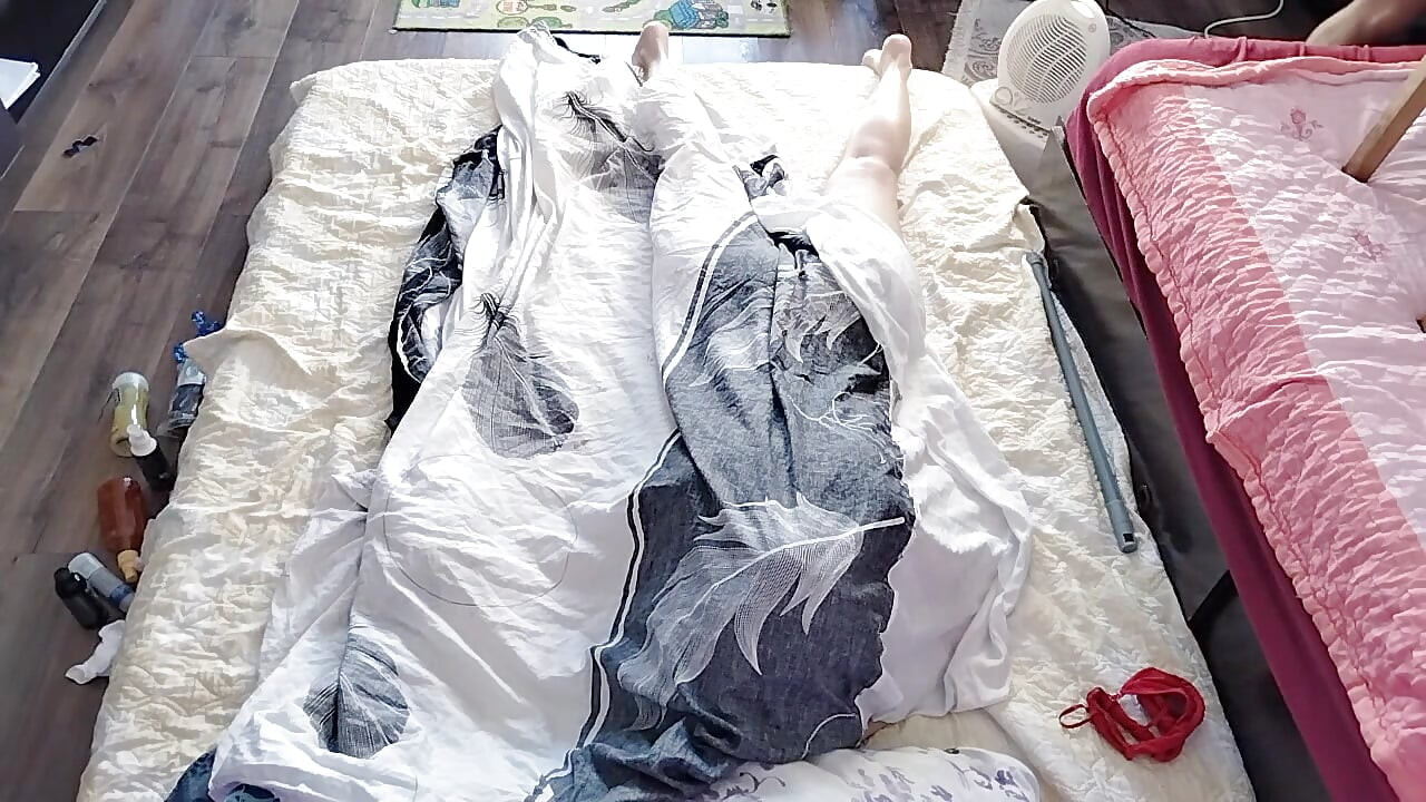 Sensual massage of a hot couple with oil on the body.