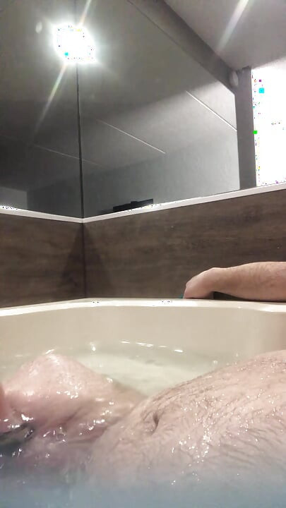 Flab fun in a jacuzzi! Slim n sexy Rachel Wriggler has slippy sliding soapy fun with a big chubby bear