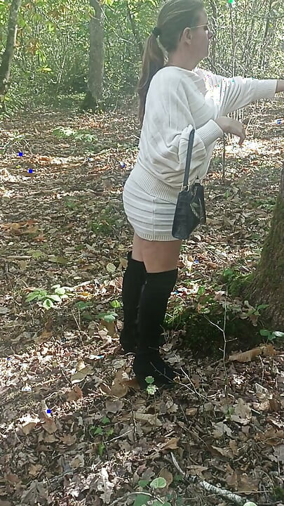 Slut Jade in the wood shows off in front of voyeur