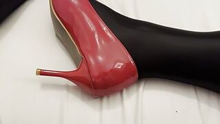 Here I'm wearing black nylon pantyhose jerking off my cock with final cumshot on my own red lacquer high heels
