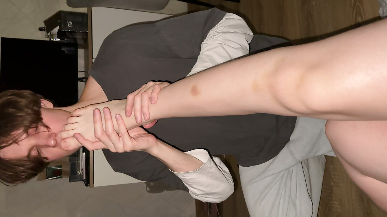 Cute Guy Licks Mistress Feet in High Heels