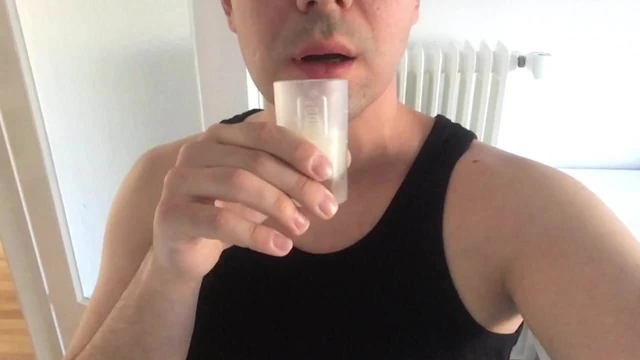 Drinking a cup of cum
